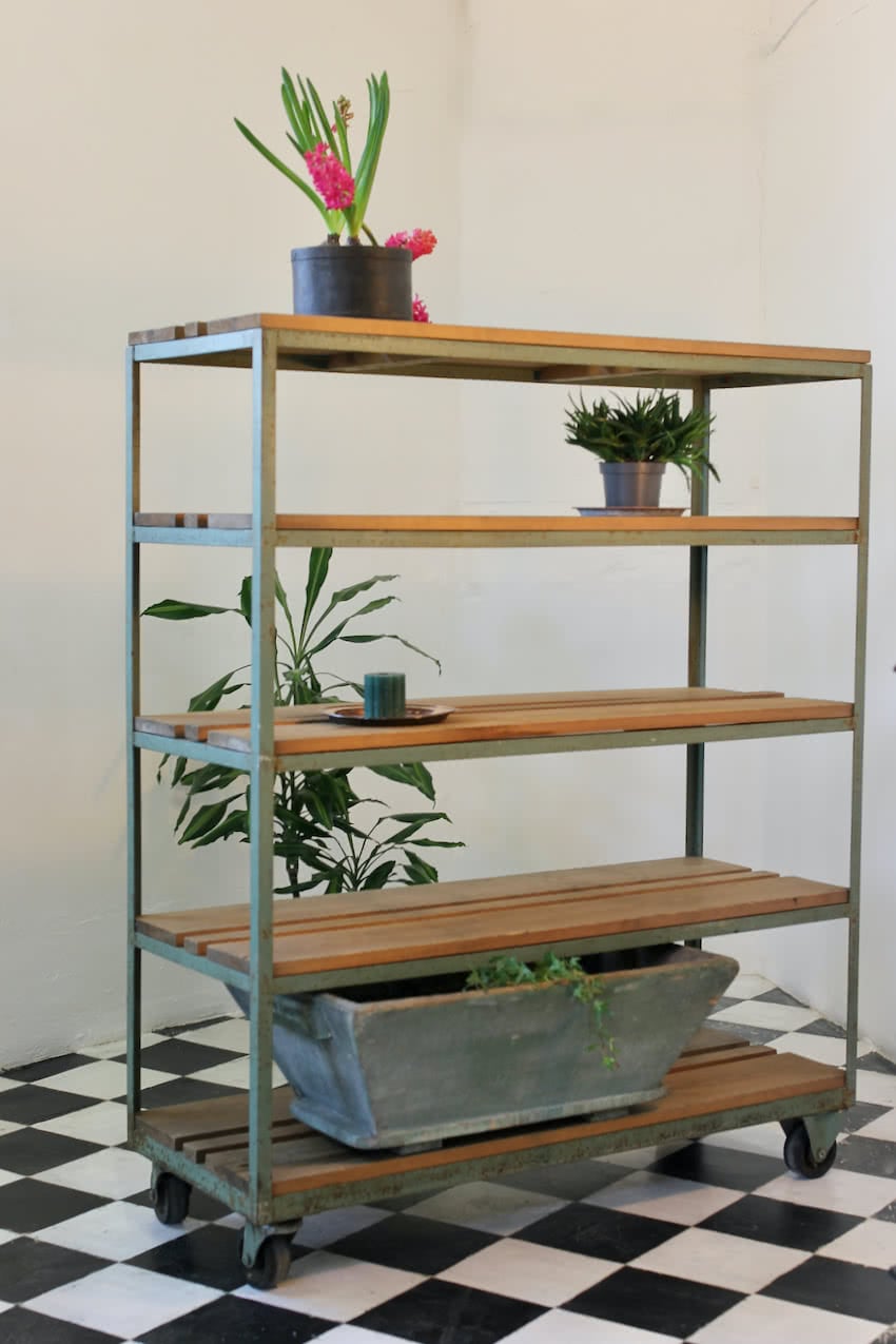 vintage shelving unit on wheels