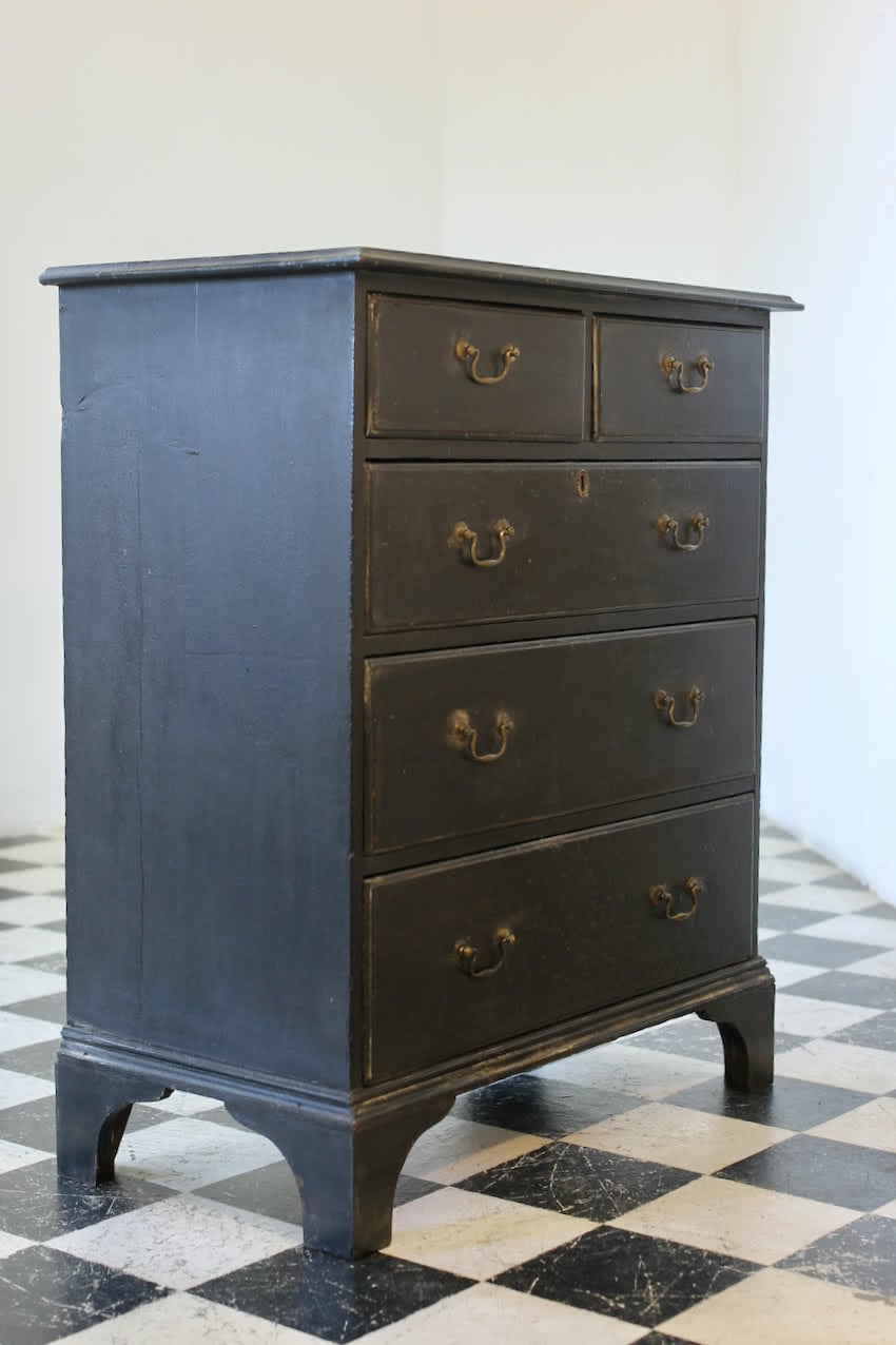 restored & refinished georgian tall pine black chest of five graduating drawers with brass swan neck handles & typical shaped feet.