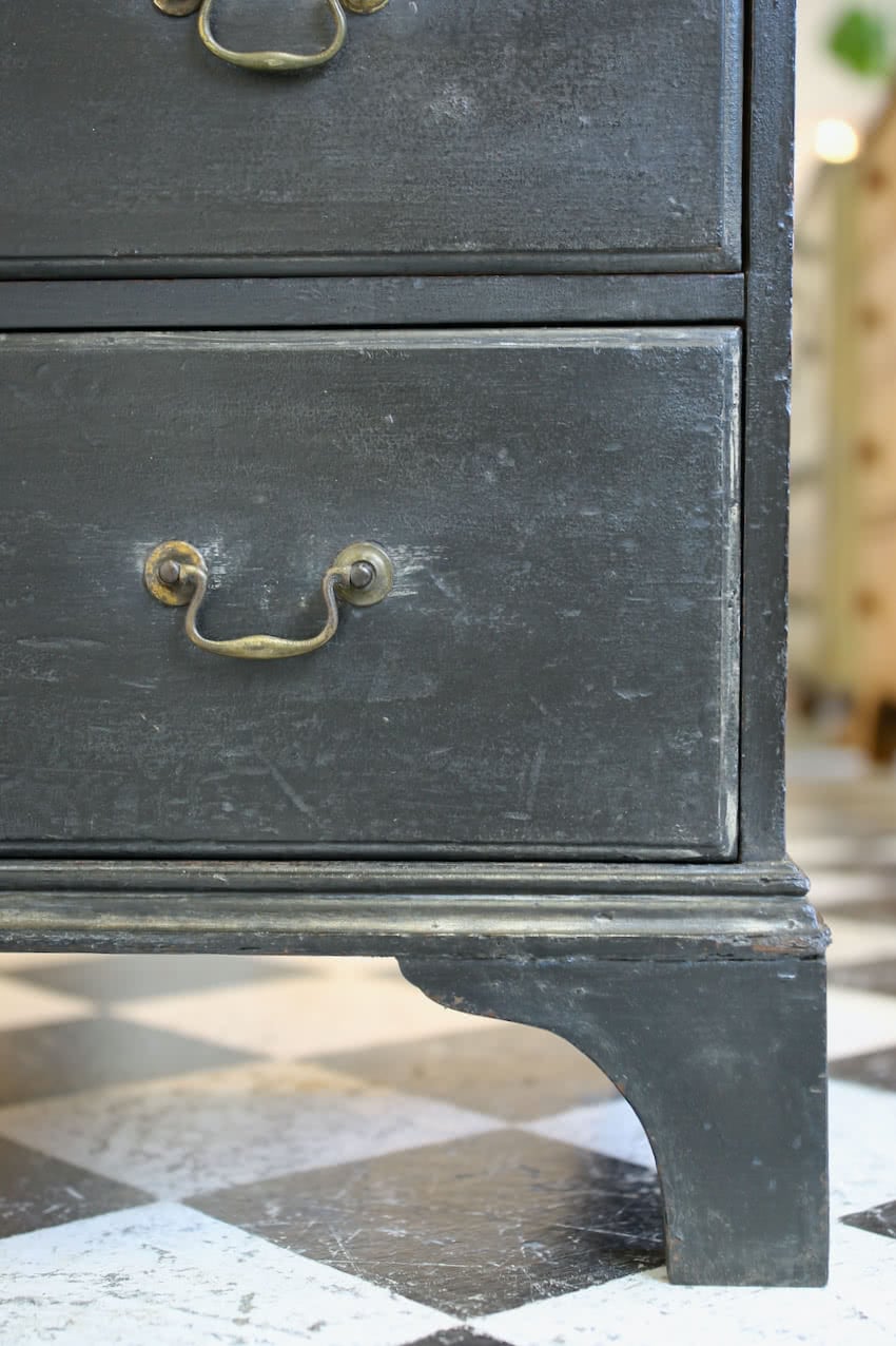 restored & refinished georgian tall pine black chest of five graduating drawers with brass swan neck handles & typical shaped feet.