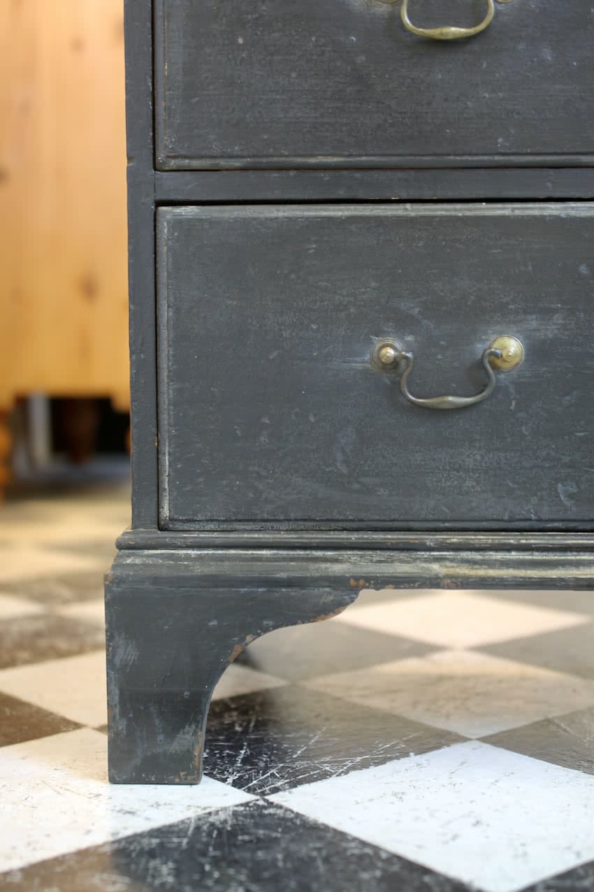restored & refinished georgian tall pine black chest of five graduating drawers with brass swan neck handles & typical shaped feet.