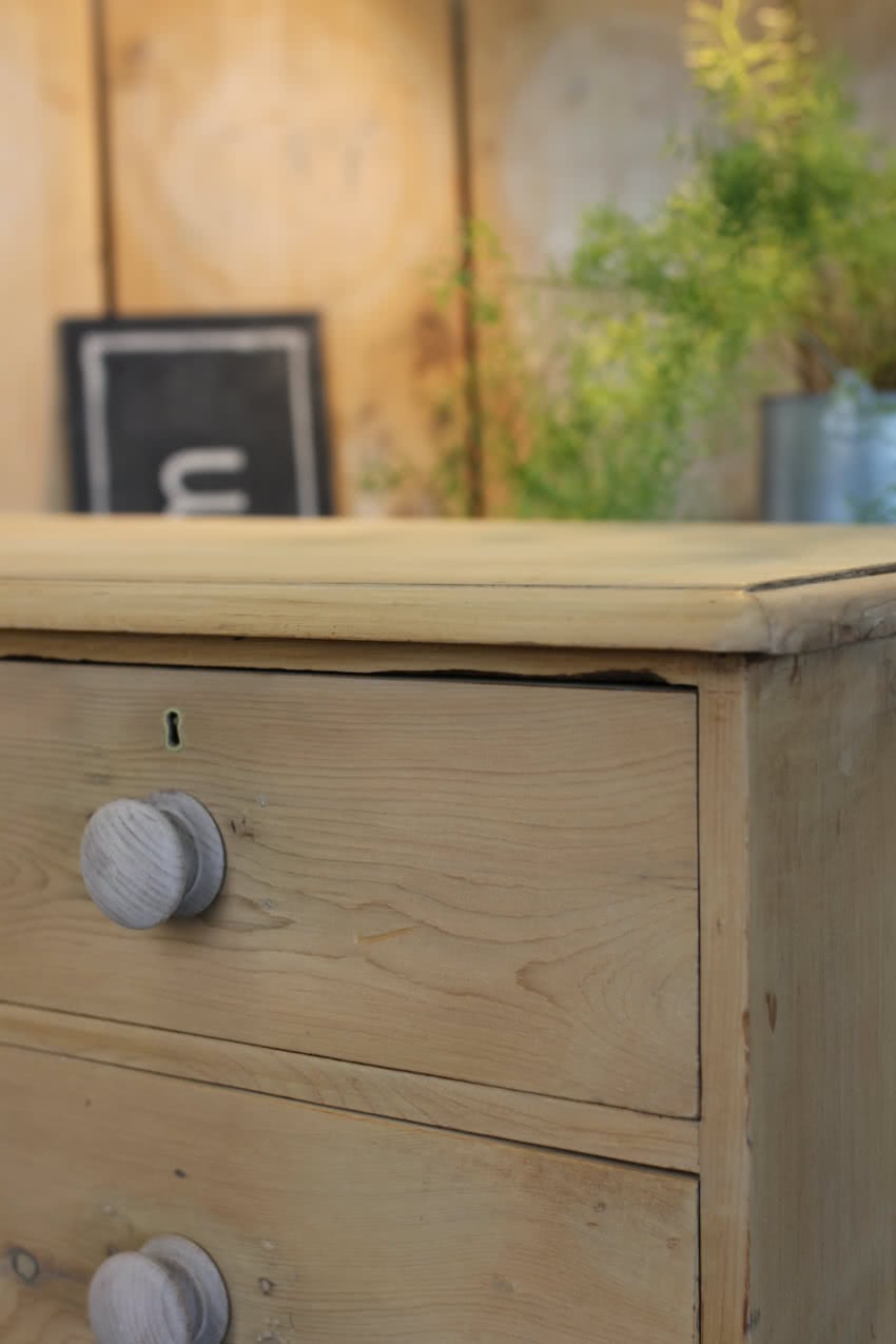 gorgeous looking antique english pine chest with new knobs and original feet, a very solid large chest of drawers.