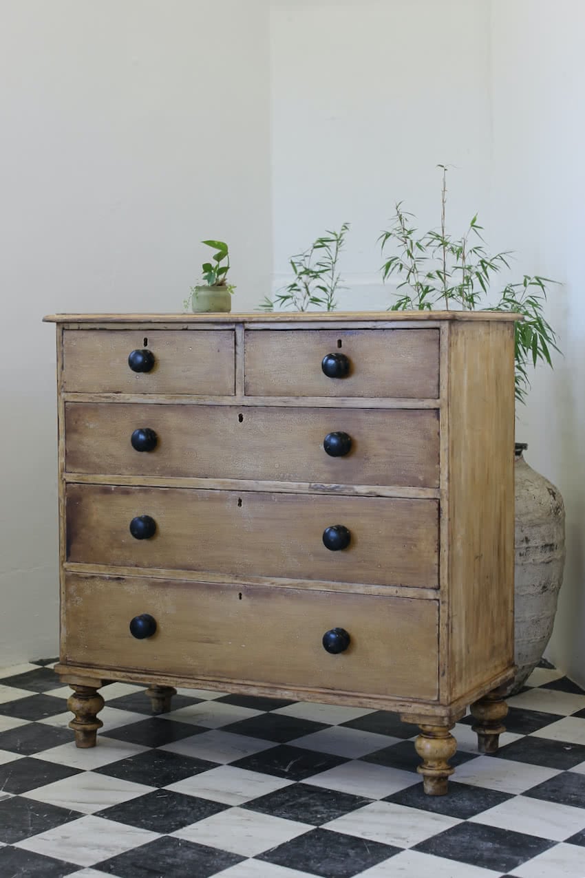 large restored antique pine chest with nice rounded shaping and sits on plinth