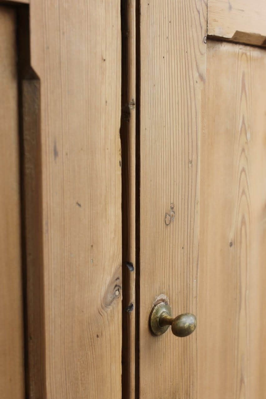 very pretty galleried french all original pine two door cupboardcupboard with shelf & metal handles and typical hinges.